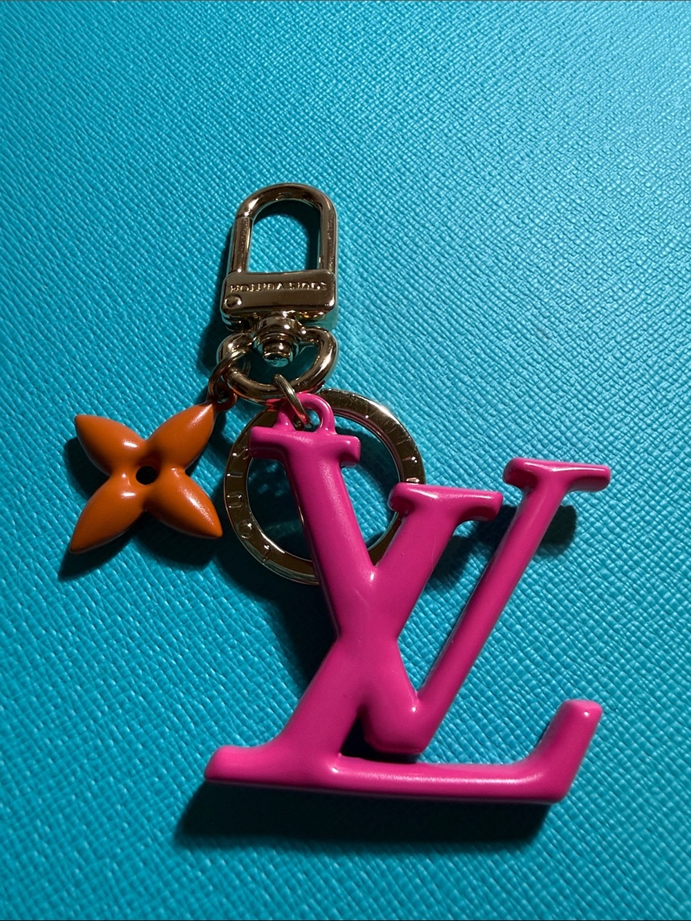 Fuchsia and coral flower bag charm